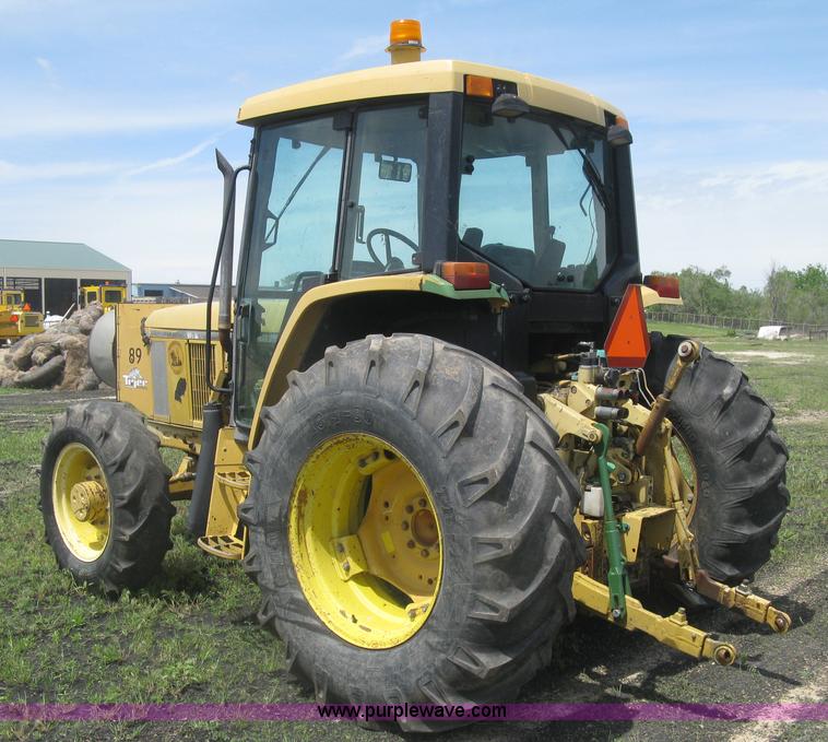 image for item J2805 1996 John Deere 6400 MFWD tractor