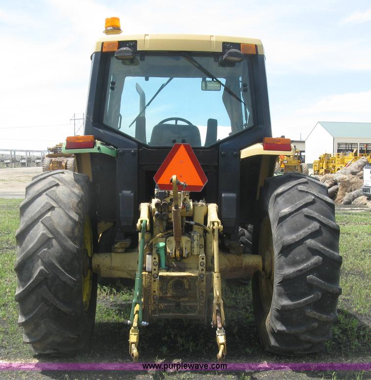image for item J2805 1996 John Deere 6400 MFWD tractor