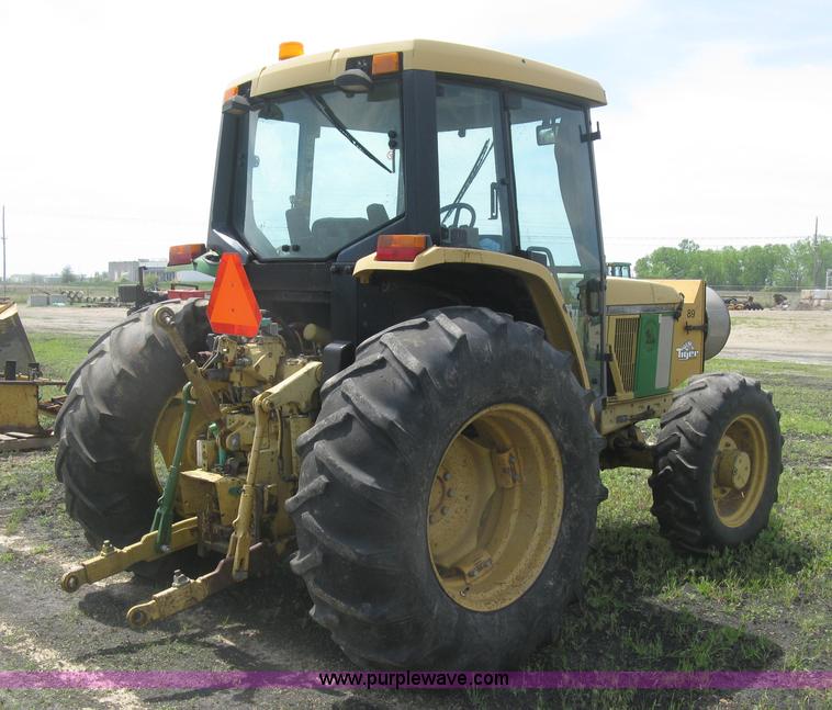 image for item J2805 1996 John Deere 6400 MFWD tractor