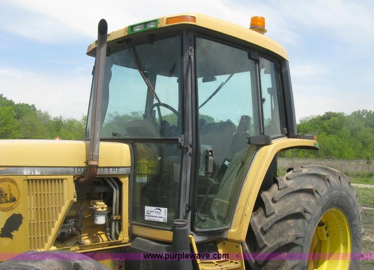 image for item J2805 1996 John Deere 6400 MFWD tractor