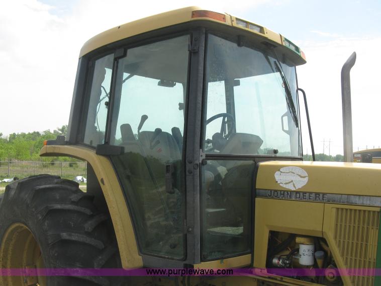 image for item J2805 1996 John Deere 6400 MFWD tractor