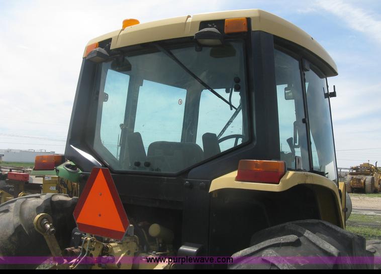 image for item J2805 1996 John Deere 6400 MFWD tractor