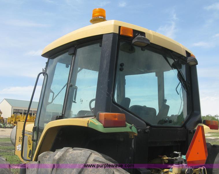 image for item J2805 1996 John Deere 6400 MFWD tractor