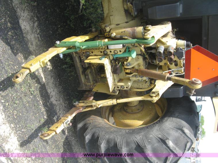 image for item J2805 1996 John Deere 6400 MFWD tractor