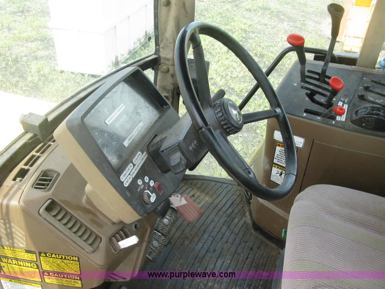 image for item J2805 1996 John Deere 6400 MFWD tractor
