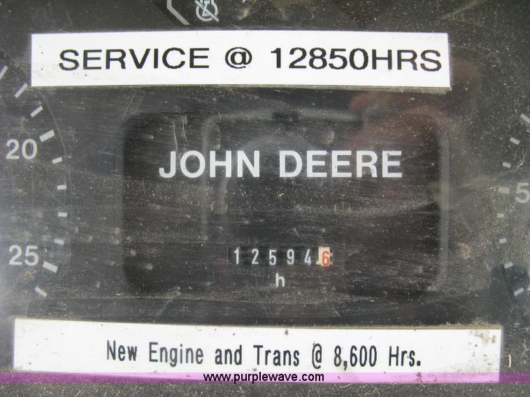 image for item J2805 1996 John Deere 6400 MFWD tractor