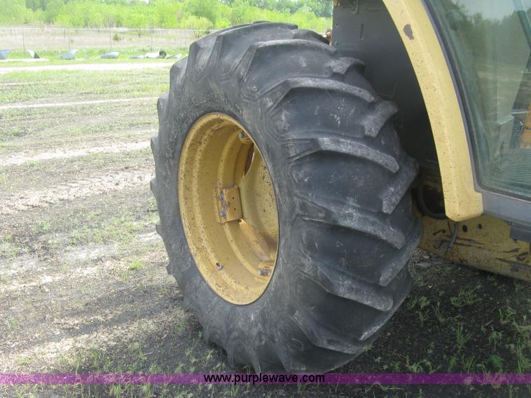 image for item J2805 1996 John Deere 6400 MFWD tractor