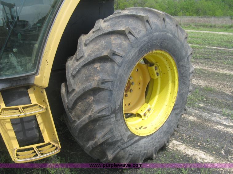 image for item J2805 1996 John Deere 6400 MFWD tractor