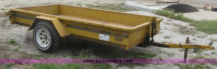 image for item J2823 Hustler tilt deck trailer