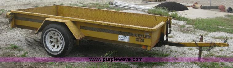 image for item J2823 Hustler tilt deck trailer