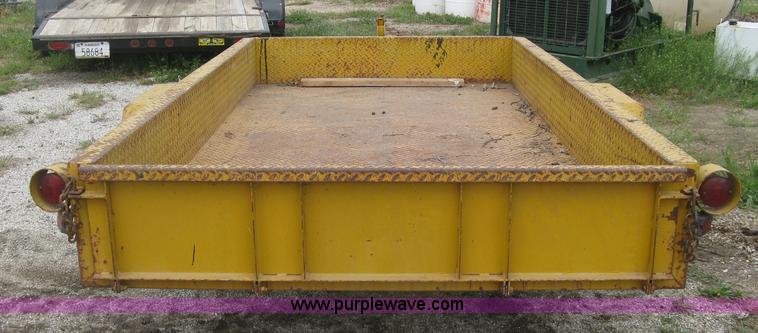 image for item J2823 Hustler tilt deck trailer