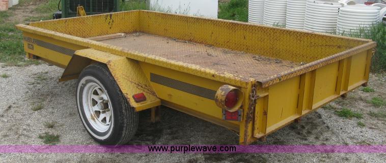 image for item J2823 Hustler tilt deck trailer