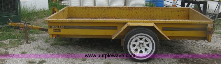 image for item J2823 Hustler tilt deck trailer