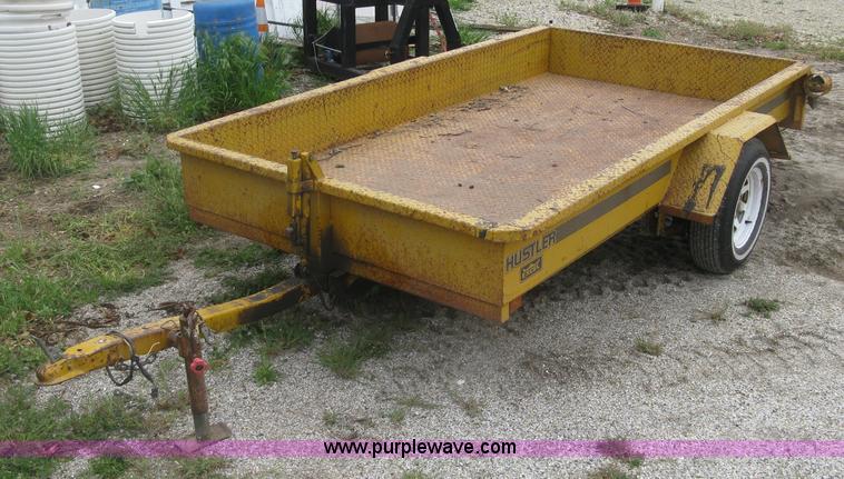 image for item J2823 Hustler tilt deck trailer