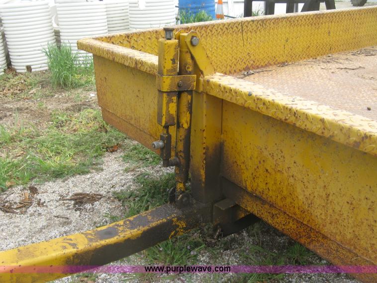 image for item J2823 Hustler tilt deck trailer