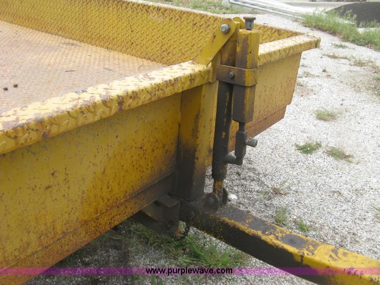 image for item J2823 Hustler tilt deck trailer