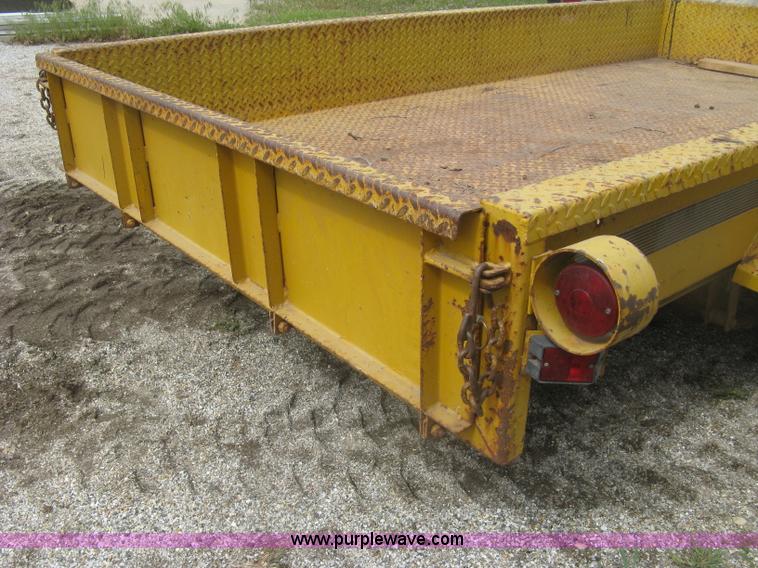 image for item J2823 Hustler tilt deck trailer