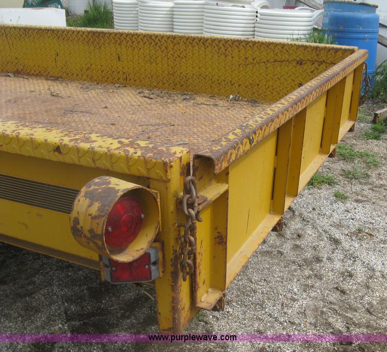 image for item J2823 Hustler tilt deck trailer