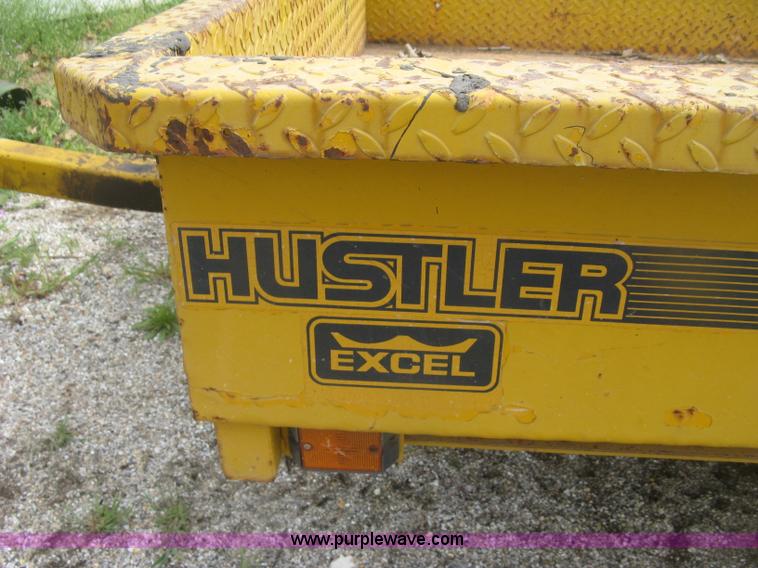 image for item J2823 Hustler tilt deck trailer