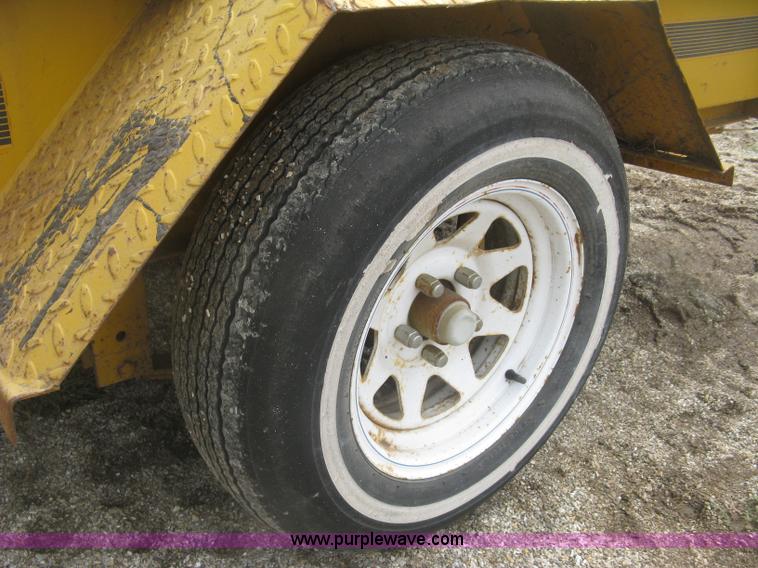 image for item J2823 Hustler tilt deck trailer