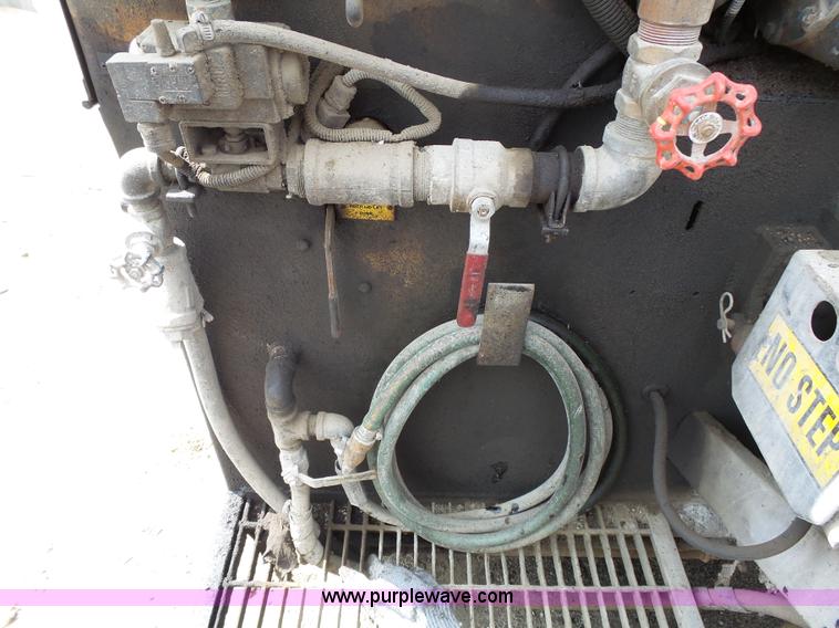 image for item J4139 1999 Volvo WG Akzo Nobel slurry truck