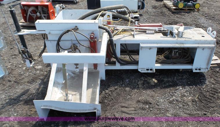 image for item L2120 CurbCat 450D curb and gutter slip forming skid steer attachment