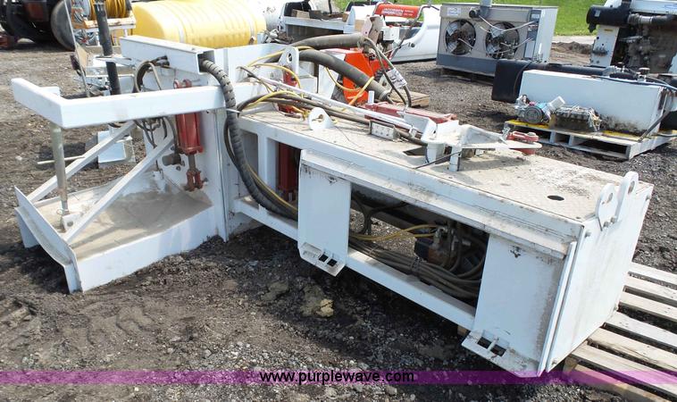 image for item L2120 CurbCat 450D curb and gutter slip forming skid steer attachment