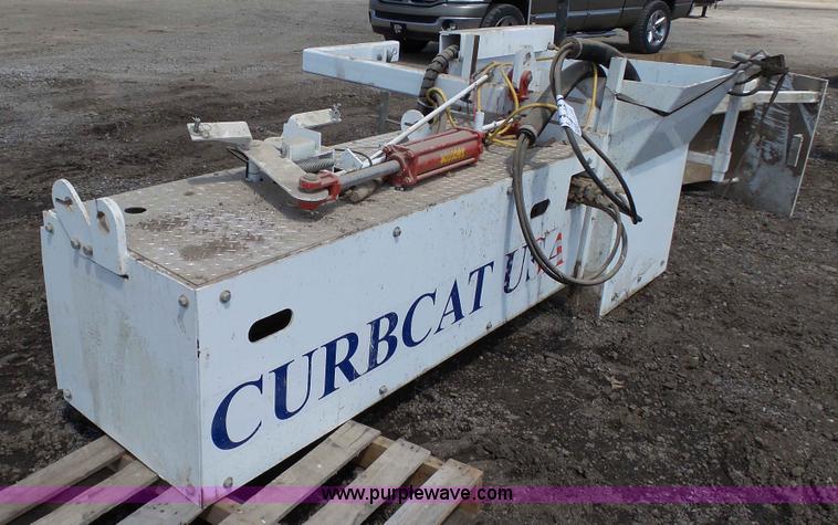 image for item L2120 CurbCat 450D curb and gutter slip forming skid steer attachment