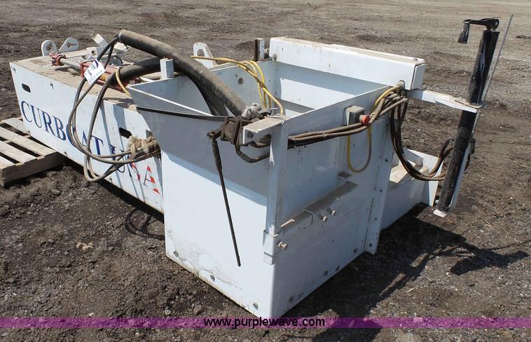 image for item L2120 CurbCat 450D curb and gutter slip forming skid steer attachment