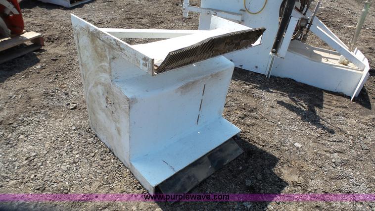 image for item L2120 CurbCat 450D curb and gutter slip forming skid steer attachment