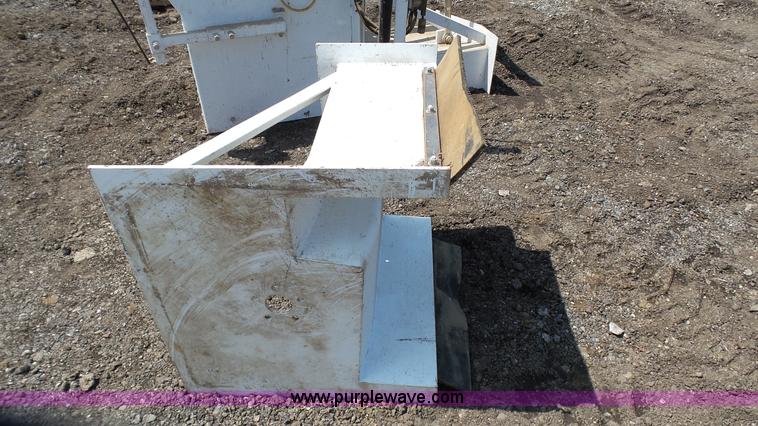 image for item L2120 CurbCat 450D curb and gutter slip forming skid steer attachment