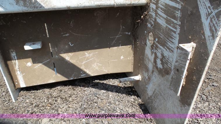 image for item L2120 CurbCat 450D curb and gutter slip forming skid steer attachment