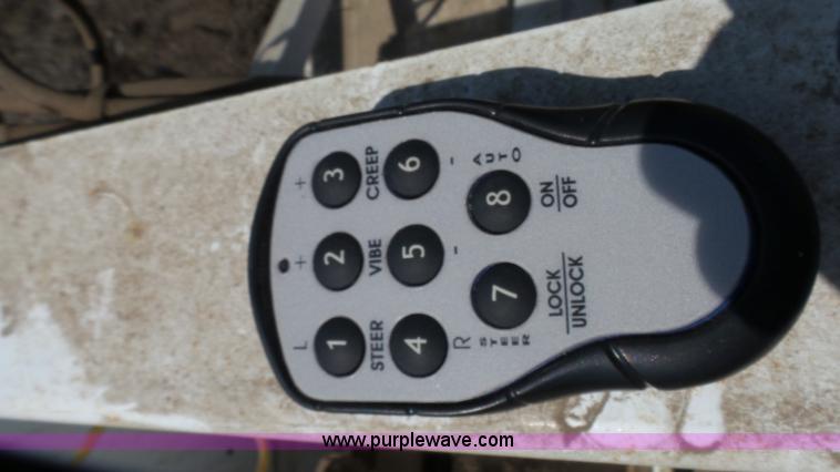 image for item L2120 CurbCat 450D curb and gutter slip forming skid steer attachment