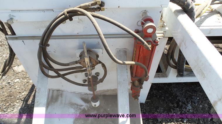 image for item L2120 CurbCat 450D curb and gutter slip forming skid steer attachment