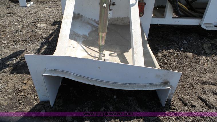 image for item L2120 CurbCat 450D curb and gutter slip forming skid steer attachment