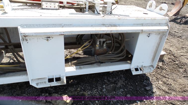 image for item L2120 CurbCat 450D curb and gutter slip forming skid steer attachment