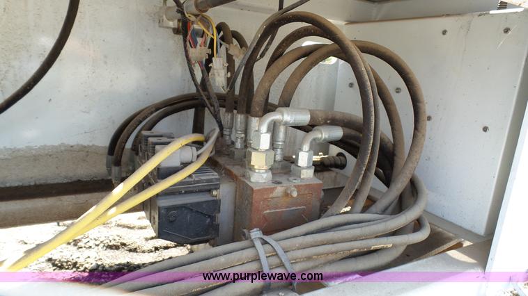 image for item L2120 CurbCat 450D curb and gutter slip forming skid steer attachment