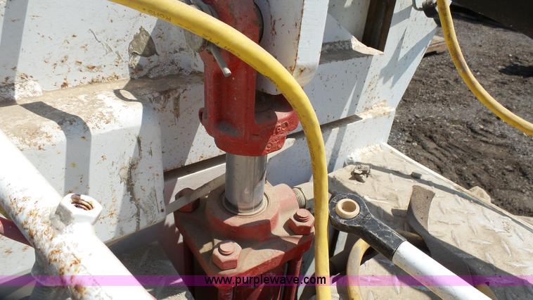 image for item L2120 CurbCat 450D curb and gutter slip forming skid steer attachment