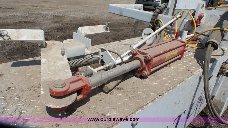 image for item L2120 CurbCat 450D curb and gutter slip forming skid steer attachment