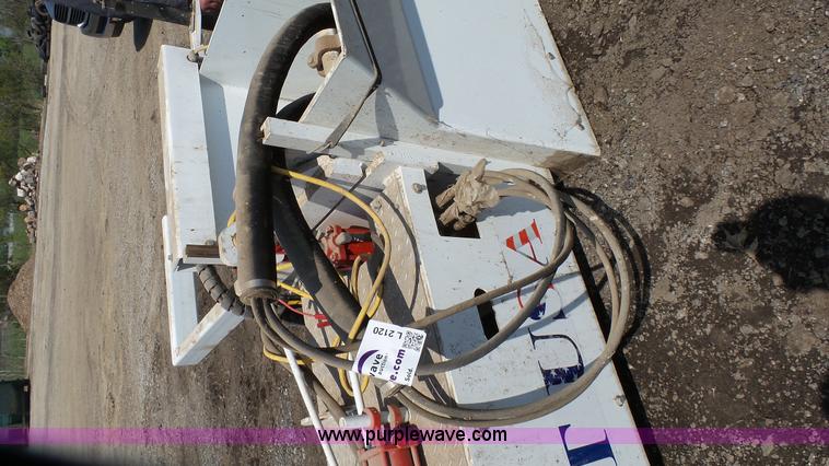 image for item L2120 CurbCat 450D curb and gutter slip forming skid steer attachment