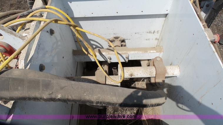 image for item L2120 CurbCat 450D curb and gutter slip forming skid steer attachment