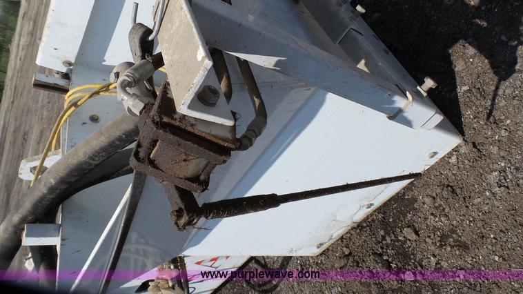 image for item L2120 CurbCat 450D curb and gutter slip forming skid steer attachment