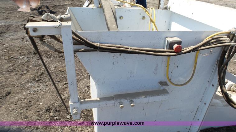 image for item L2120 CurbCat 450D curb and gutter slip forming skid steer attachment