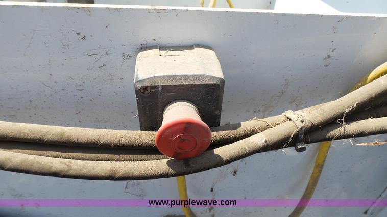 image for item L2120 CurbCat 450D curb and gutter slip forming skid steer attachment