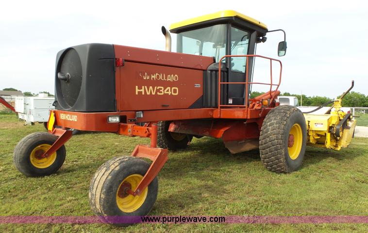 image for item J4935 2003 New Holland HW340 self-propelled windrower