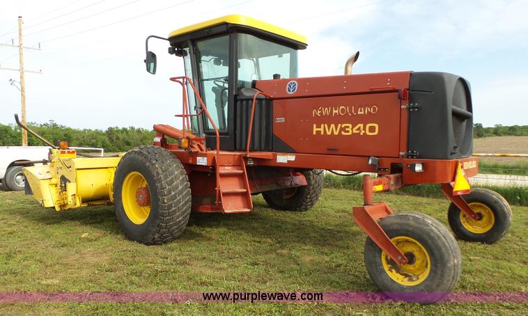 image for item J4935 2003 New Holland HW340 self-propelled windrower