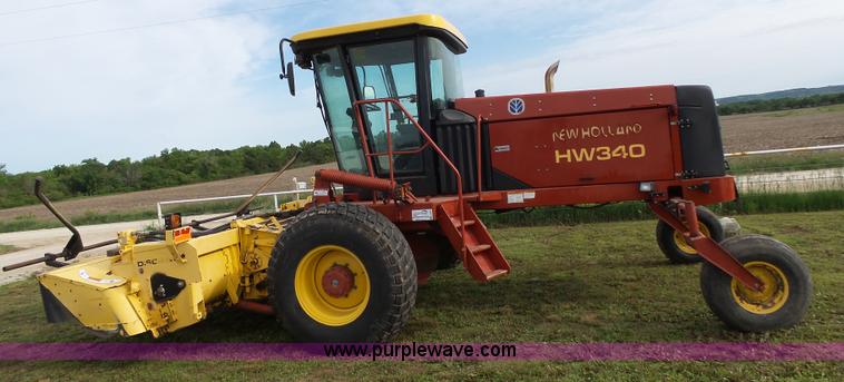 image for item J4935 2003 New Holland HW340 self-propelled windrower
