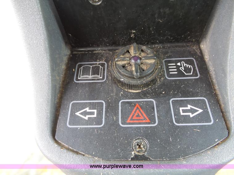 image for item J4935 2003 New Holland HW340 self-propelled windrower