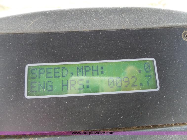 image for item J4935 2003 New Holland HW340 self-propelled windrower