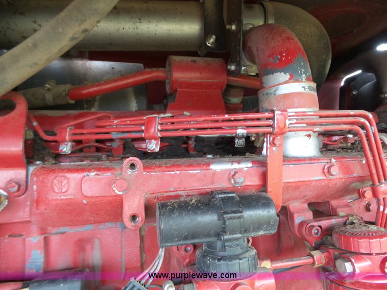 image for item J4935 2003 New Holland HW340 self-propelled windrower